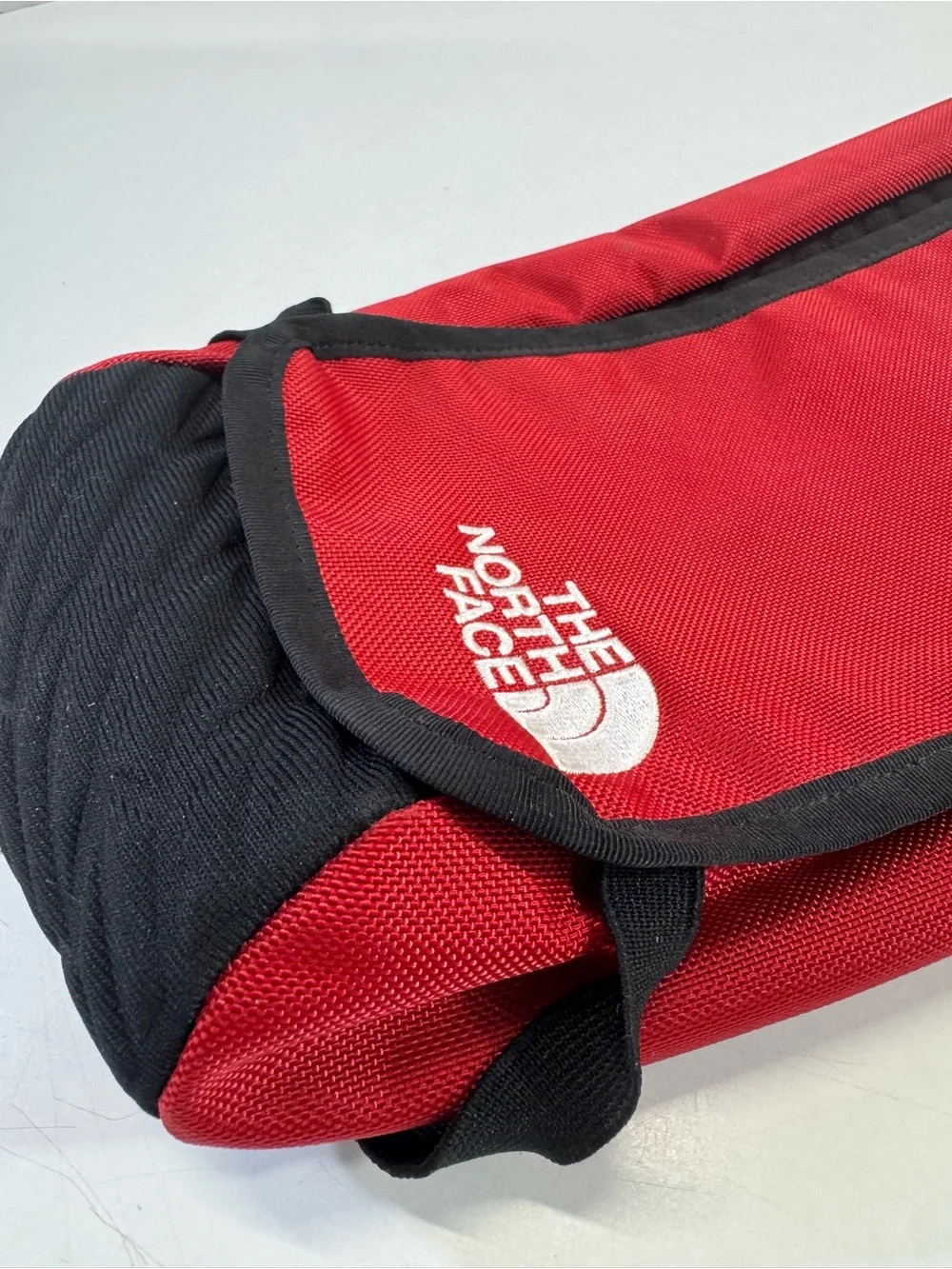 The North Face Red and Black small 12” padded pouch camping hiking biking